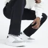 White leather lace up trainers sold by River Island