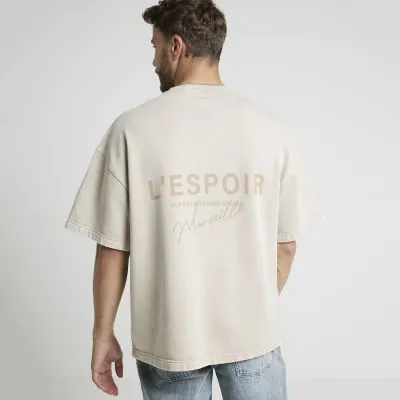 Stone oversized fit graphic script t-shirt sold by River Island