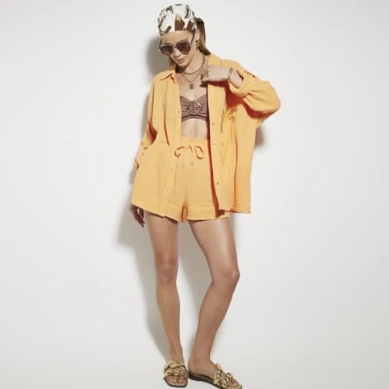 Orange textured beach shorts sold by River Island