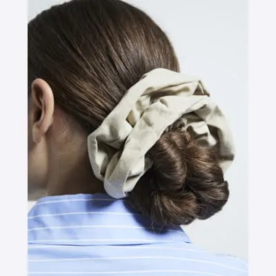 Brown oversized hair scrunchie sold by River Island
