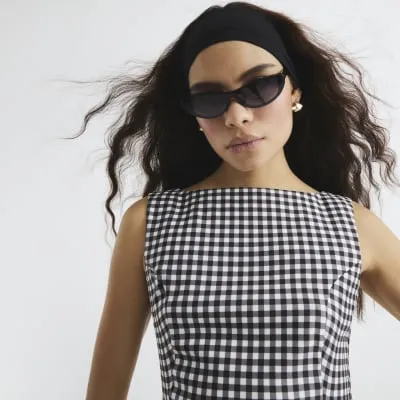 Brown Gingham Sleeveless Peplum Top sold by River Island