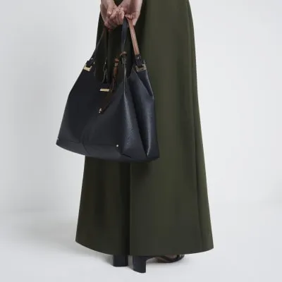 Black slouch tote bag sold by River Island