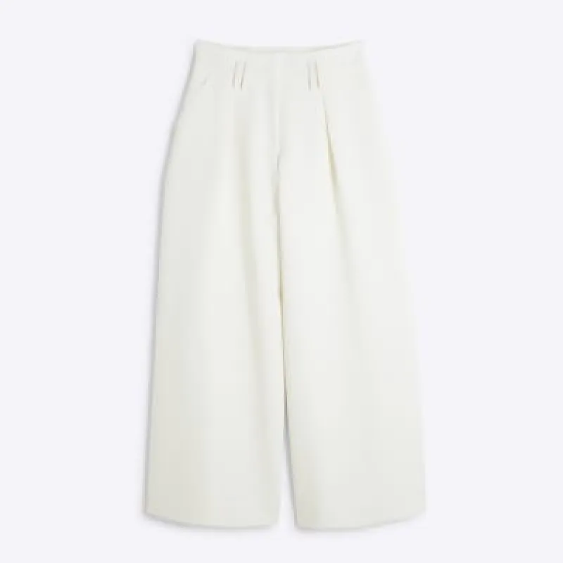 Petite Cream High Waisted Wide Leg Trousers sold by River Island