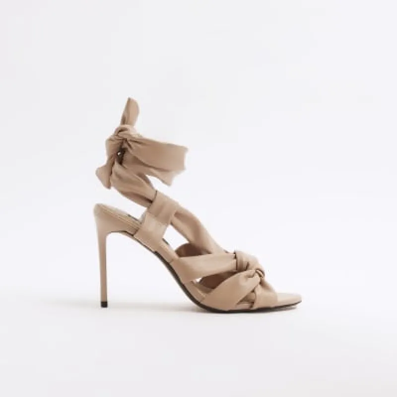 Pink twist heeled sandals sold by River Island