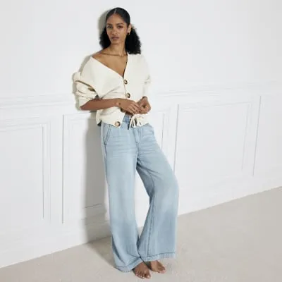 Blue mid rise drawstring loose wide leg jeans sold by River Island
