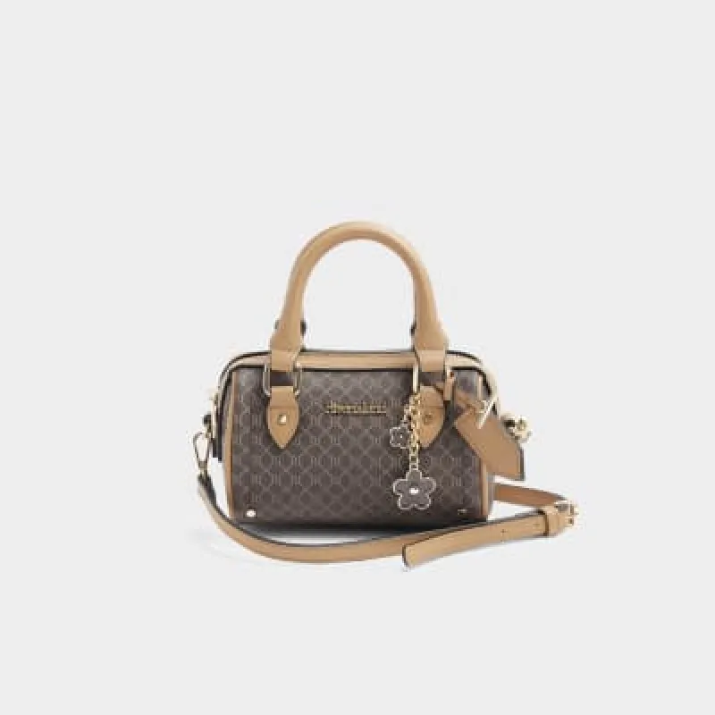 Brown monogram bowler mini cross body bag sold by River Island