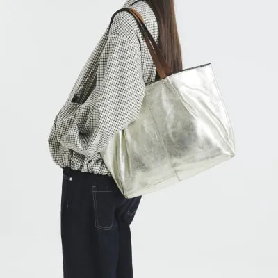 Gold Leather Metallic Shoulder Bag sold by River Island