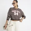 Brown stripe NYC cropped sweatshirt sold by River Island