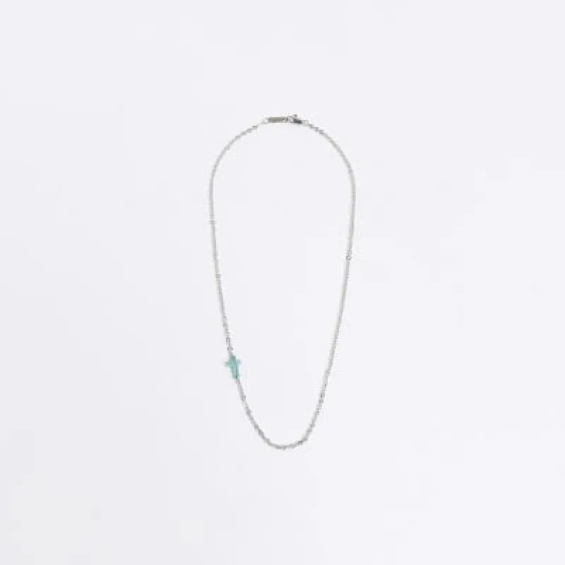 Silver marble cross necklace sold by River Island