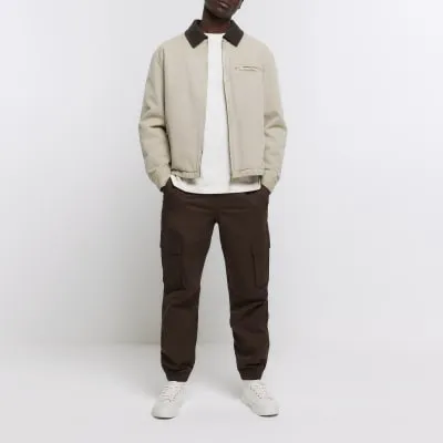 Washed brown slim fit cargo joggers sold by River Island