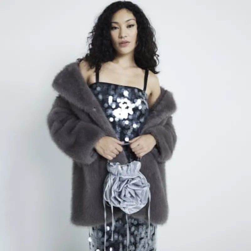 Silver Corsage Diamante Top Handle Bucket Bag sold by River Island