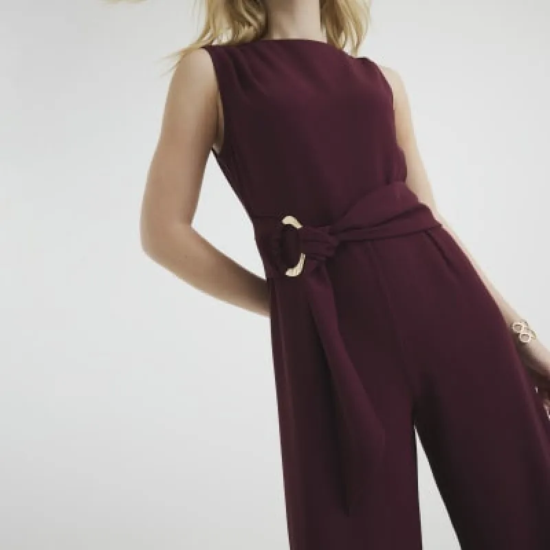 Red Sleeveless Belted Jumpsuit sold by River Island