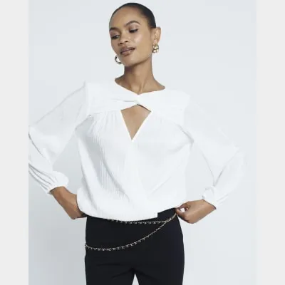 Cream Plisse Bubble Hem Wrap Top sold by River Island