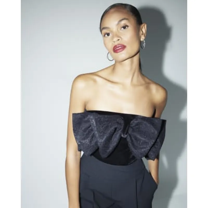 Black lace bow velvet bandeau bodysuit sold by River Island