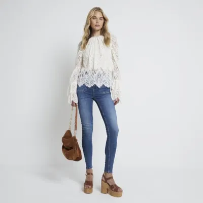 Blue high waisted pocket super skinny jeans sold by River Island