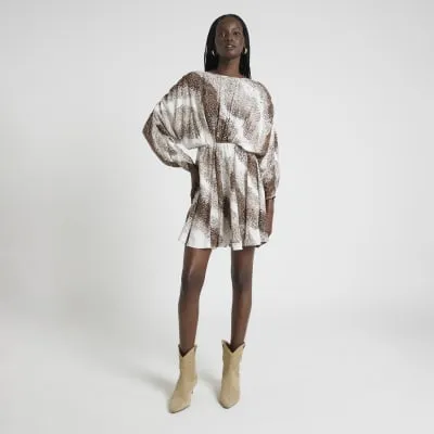 Cream Leopard Print Mini Dress sold by River Island