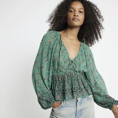 Green floral tie front top sold by River Island