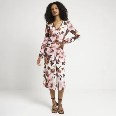 Pink abstract floral bodycon midi dress sold by River Island