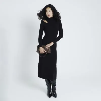 Black long sleeve cut out midi dress sold by River Island