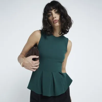 Green Pleated Peplum Top sold by River Island