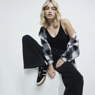 Black Ribbed V Neck Cami Top sold by River Island