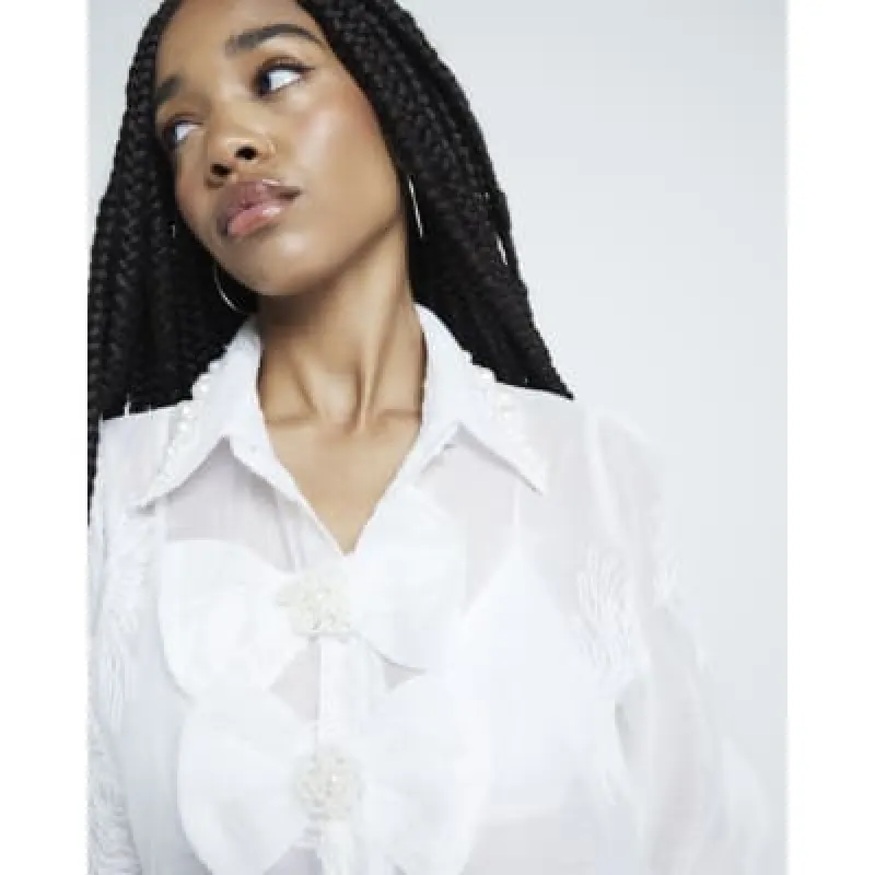 White bow long sleeve Blouse sold by River Island