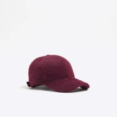Red fluffy textured cap sold by River Island