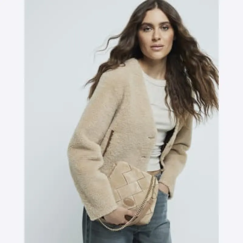 Beige Suede Fringed Woven Cross body bag sold by River Island