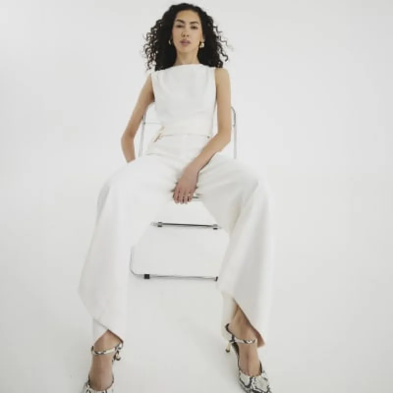 White Sleeveless Belted Jumpsuit sold by River Island