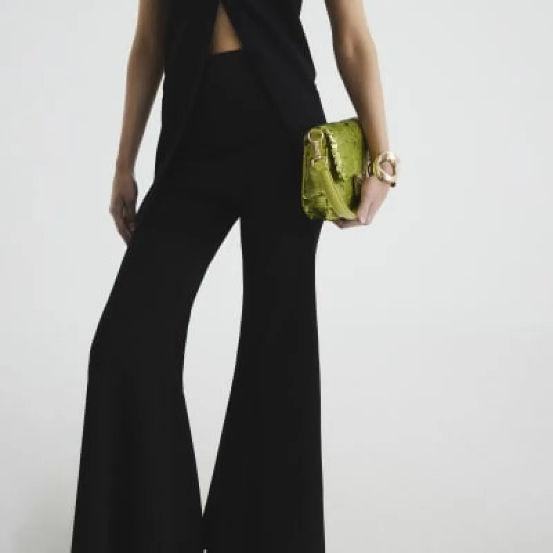 Black Wide Flare Trousers sold by River Island