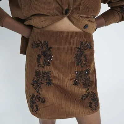 Brown Embellished Corduroy Mini Skirt sold by River Island
