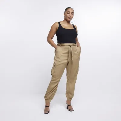 Plus beige belted cargo trousers sold by River Island