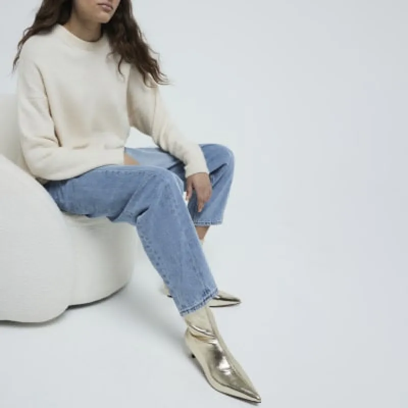 Gold Slant Heel Sock Boots sold by River Island