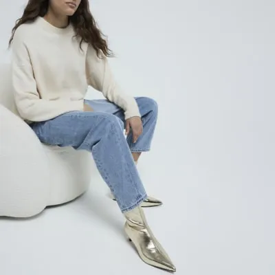 Gold Slant Heel Sock Boots sold by River Island