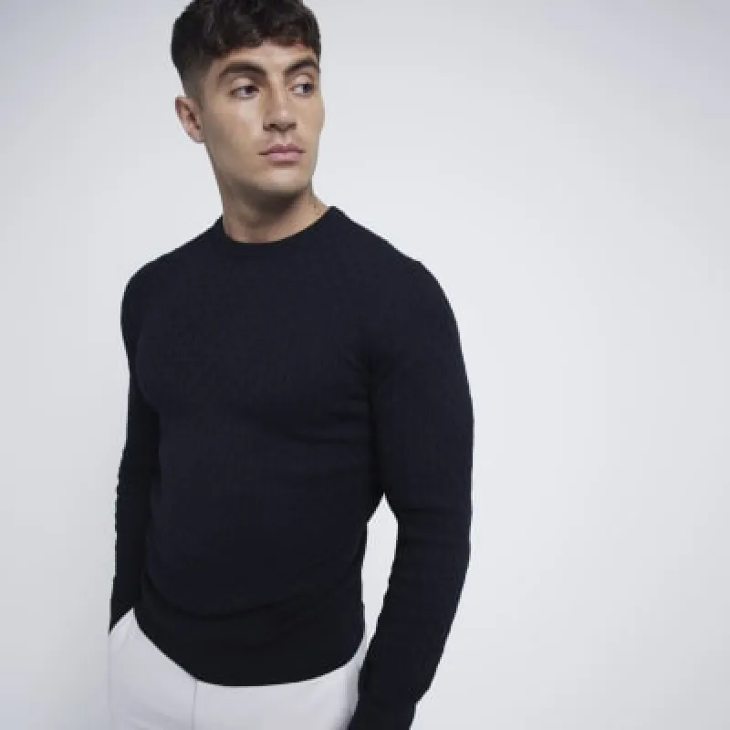 Black muscle fit cable knitted jumper sold by River Island