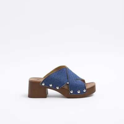Blue denim studded clog sandals sold by River Island
