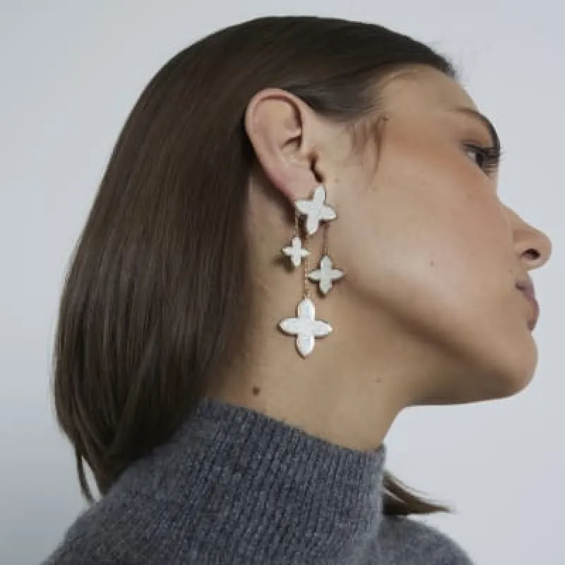 White Cascade Clover Drop Earrings sold by River Island