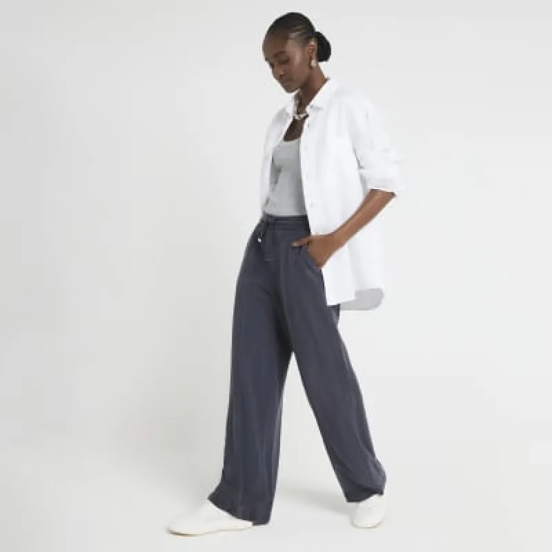 Navy Lyocell Wide Leg Trousers sold by River Island