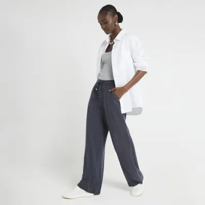 Navy Lyocell Wide Leg Trousers sold by River Island