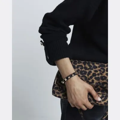 Black Stud Buckle Bracelet sold by River Island