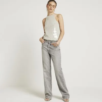 Silver sequin halter neck top sold by River Island