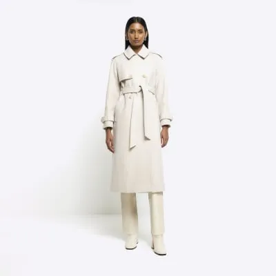 Cream belted longline trench coat sold by River Island