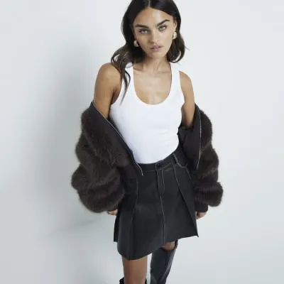 Black Faux Leather Distressed Mini Skirt sold by River Island