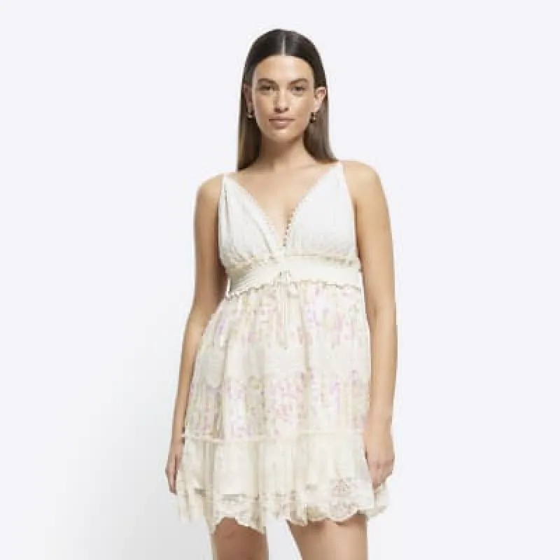Cream crochet sequin beach mini dress sold by River Island