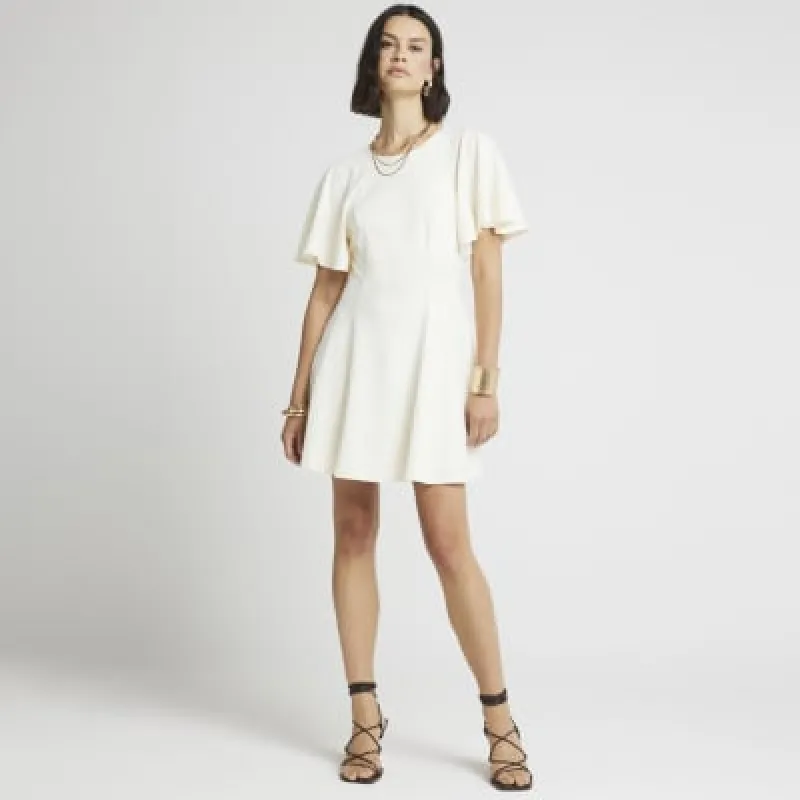 Cream flute sleeve skater mini dress sold by River Island
