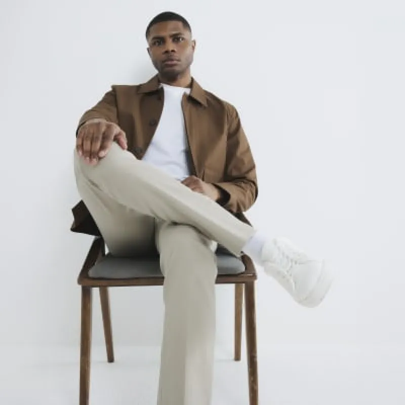 Beige Slim Fit Belted Chino Trousers sold by River Island