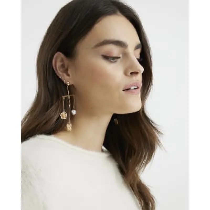 Cream Flower Pearl Drop Earrings sold by River Island