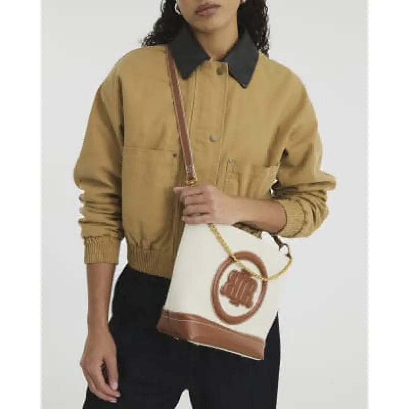 Cream Canvas Bucket Bag sold by River Island