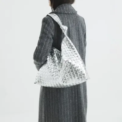 Silver Faux Leather Knot Shoulder Bag sold by River Island