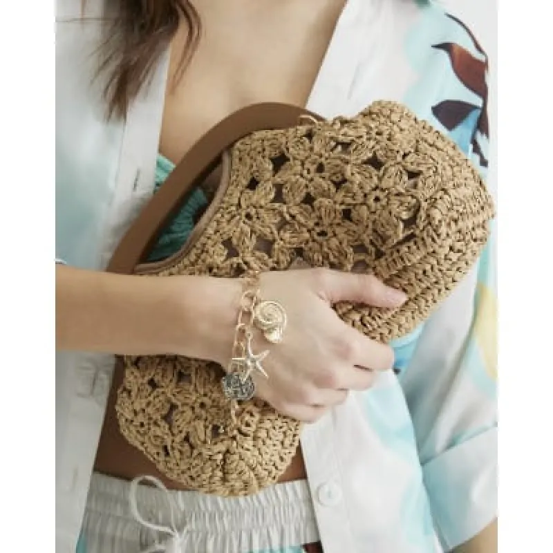 Gold Shell Charm Bracelet sold by River Island